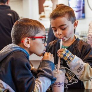 kids drinking milkshake