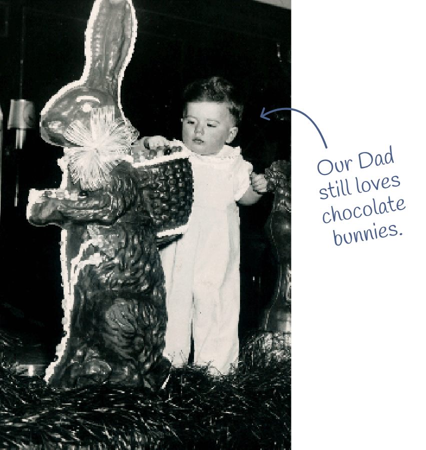 baby standing with chocolate bunny