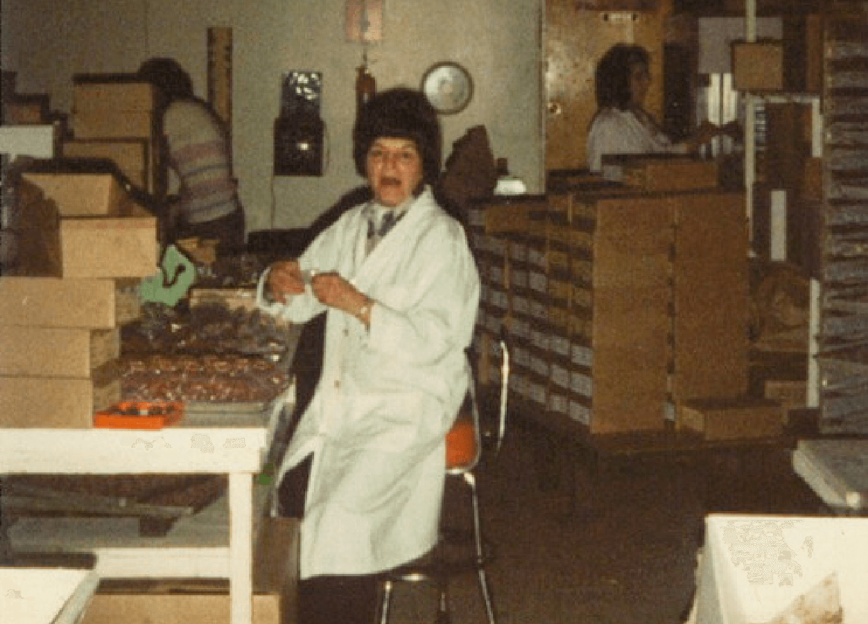 woman on chair in chocolate factory