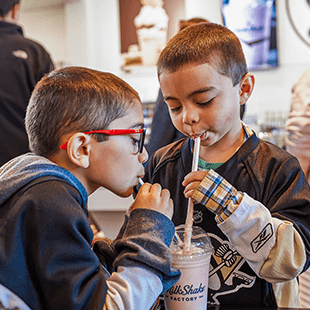 kids drinking milkshake