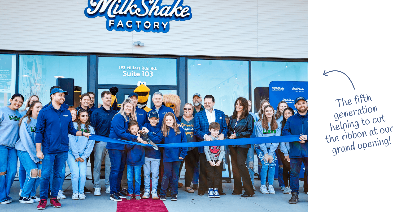 group of people cutting rope at new store