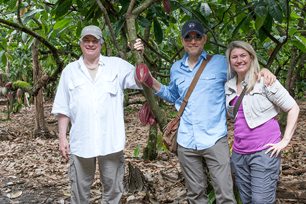 people holding cocoa pod